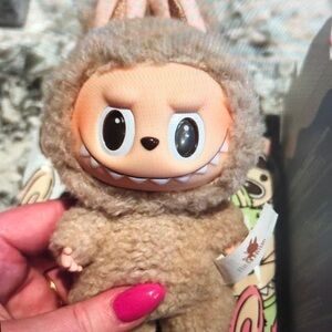 Adorable Plush Toy in Furry Outfit